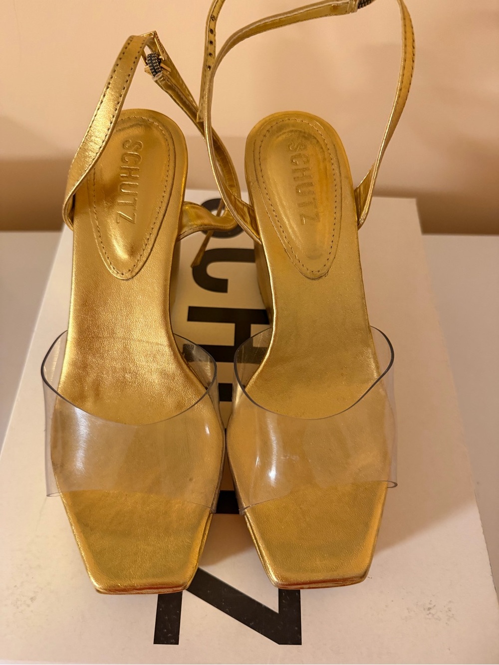 SCHUTZ Metallic Gold Slingback Sandals with Clear Toe Strap
